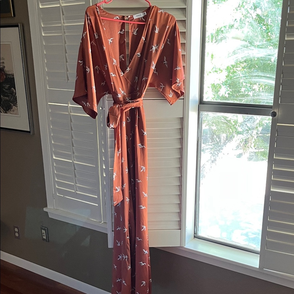 Women's Orange Bird Print Jumpsuit! Perfect for fall.